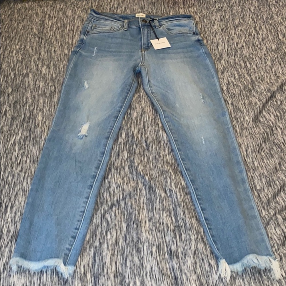 sneak peak ripped jeans